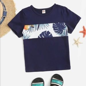 Family matching tropical outfits.